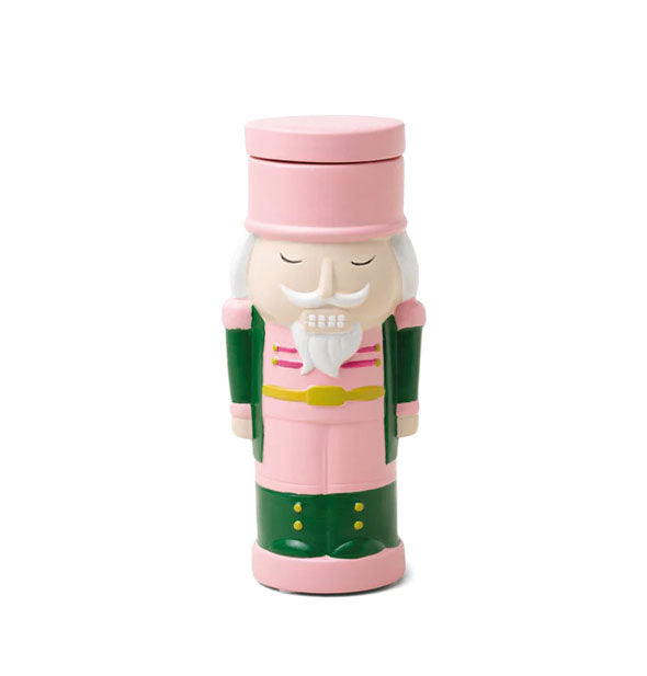Pik and green nutcracker candle with hand-painted facial details including white beard and mustache
