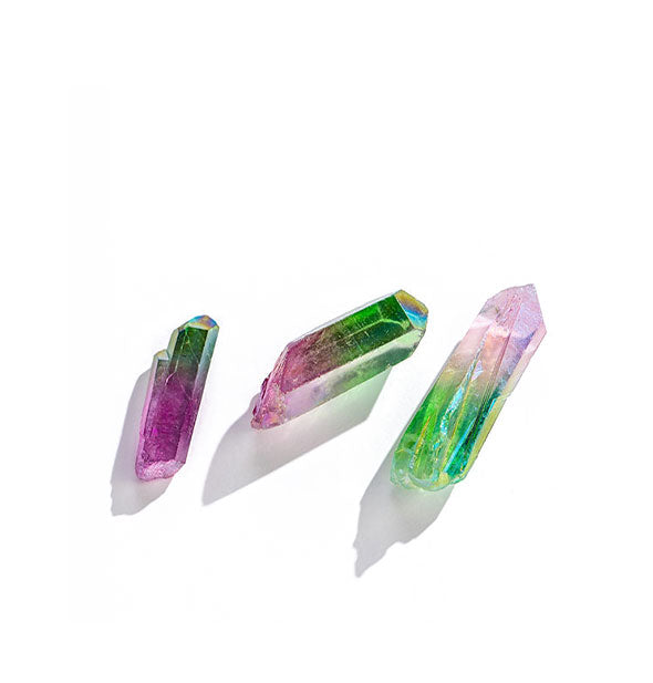 Three pink and green ombré quartz points