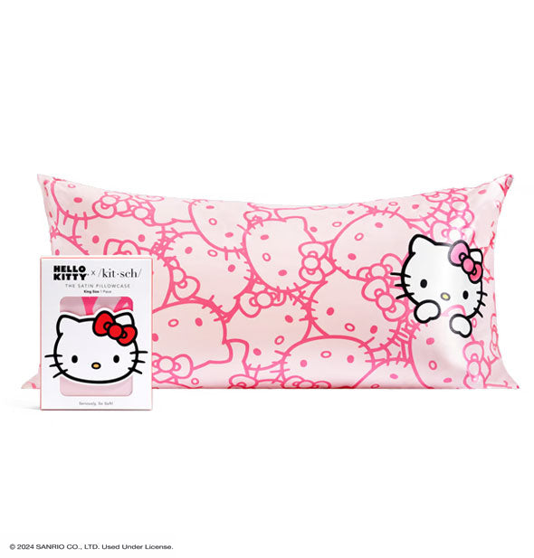 Package of one Hello Kitty x Kitsch Satin Pillowcase with king size pillowcase shown behind featuring an all-over pink Hello Kitty face pattern with accent face at right