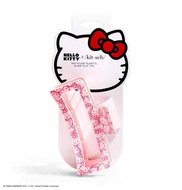 Pink open shape rectangular claw clip with Hello Kitty face print is attached to a graphic branded product card