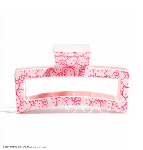 Pink open shape rectangular claw clip with all-over Hello Kitty face print