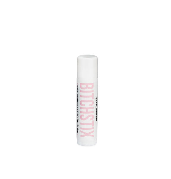 White tube of Bitchstix lip balm with light pink lettering