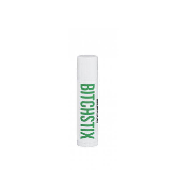 White tube of Bitchstix lip balm with green lettering