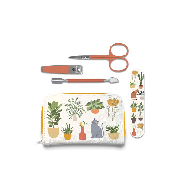 White pouch featuring illustrations of houseplants and a gray cat with matching emery board, orange-handled cuticle pusher, nail clipper, and nail scissor