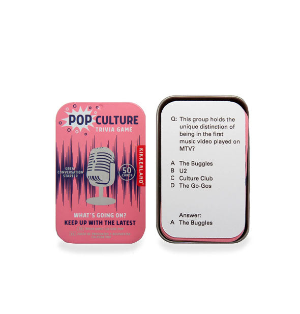 Rectangular pink Pop Culture Trivia Game tin with lid removed to reveal the top card inside: "This group holds the unique distinction of being in the first music video played on MTV?"