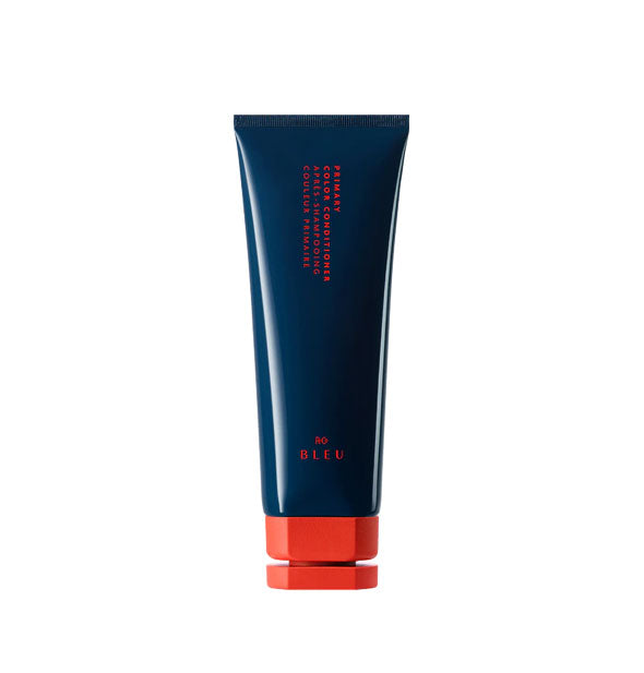 Dark blue and red bottle of R+Co Bleu Primary Color Conditioner