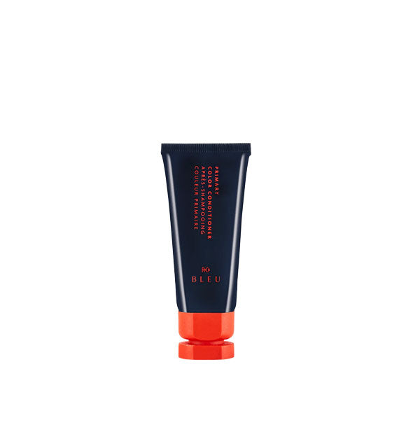 Mini dark blue and red bottle of R+Co Bleu Primary Color Conditioner