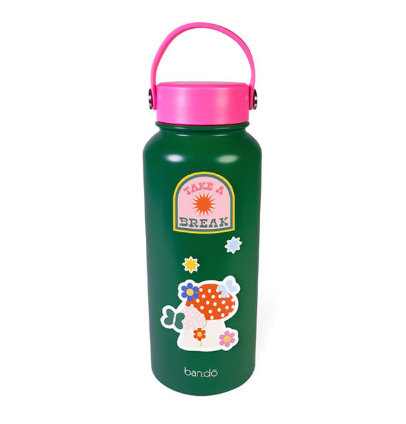Green and pink water bottle with decorative stickers attached