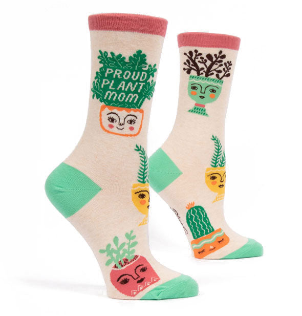 Proud Plant Mom crew socks with green heels and goes and potted plant motif