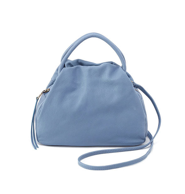 Pale blue leather satchel bag with top handle and longer strap partially extended at right side