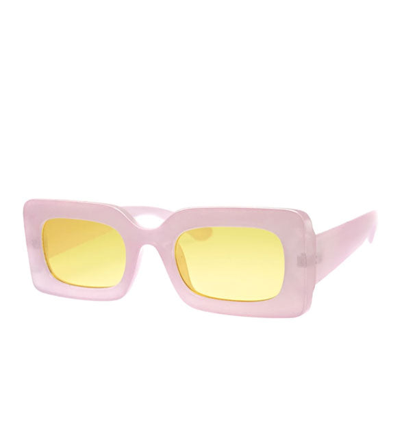 Pair of square, thick-framed lilac purple sunglasses with a yellow lens