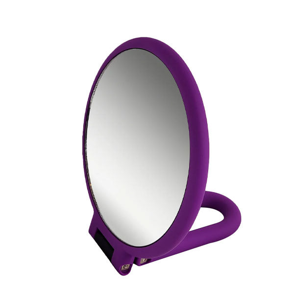Round purple hand mirror with folded-under handle base