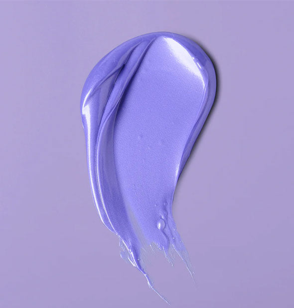 A daub of silky, purple Verb Purple Mask is applied to a purple surface