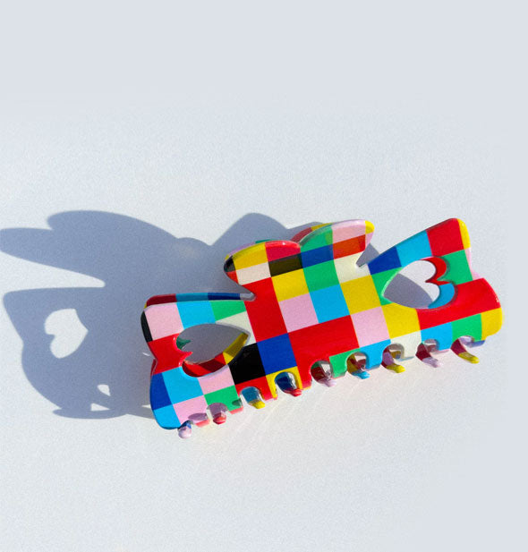 Multicolored checkered hair claw clip with heart-shaped cutout details