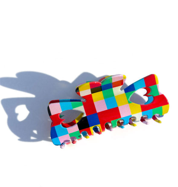 Multicolored checkered hair claw clip with heart-shaped cutout details