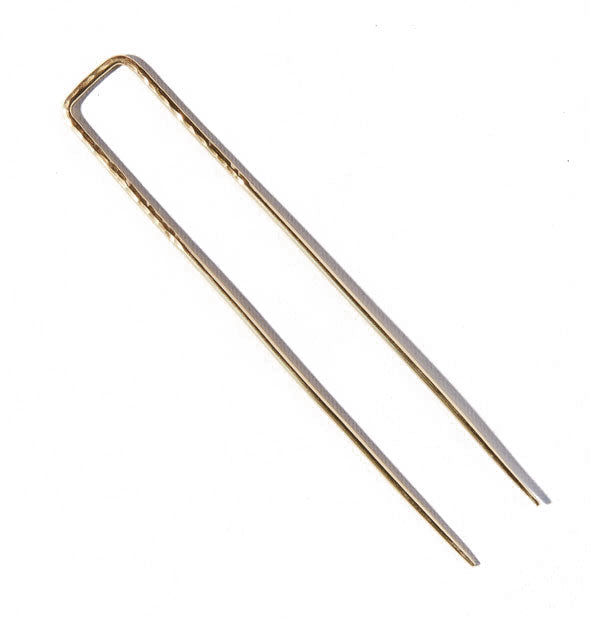 Rectangular brass pick with two prongs and a textured middle