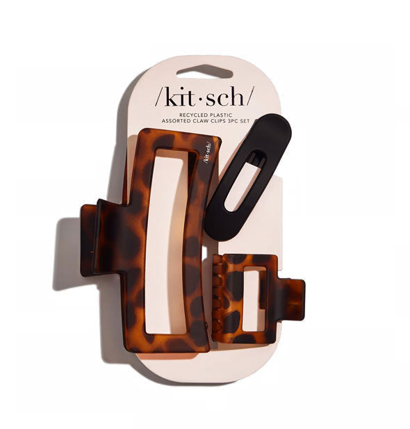 Set of three Recycled Plastic Claw Clips on Kitsch product card: one jumbo-sized matte brown tortoise, one elongated oval matte black open shape, and one smaller rectangular matte brown tortoise