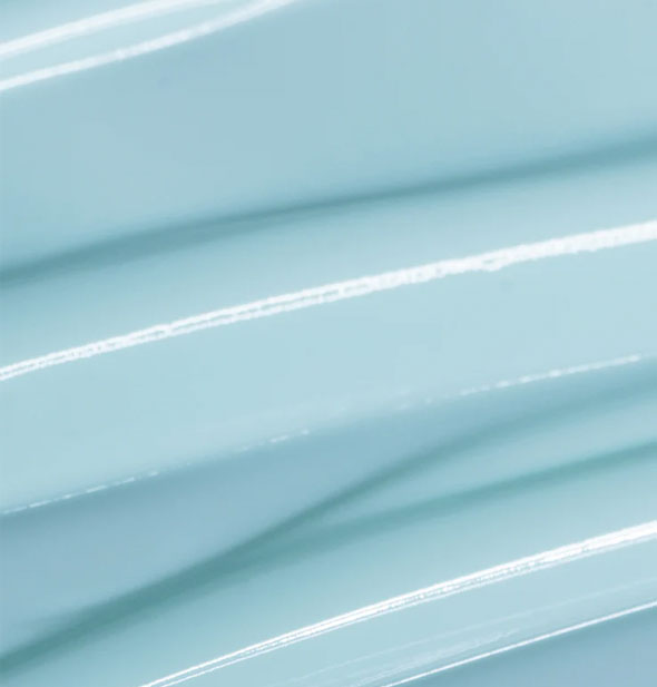 Closeup of streaked blue Coola Refreshing Water Plumping Gel Serum