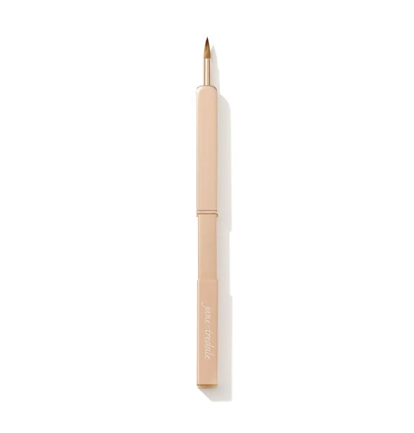 Jane Iredale Retractable Lip Brush with rose gold body and pointed bristle tip