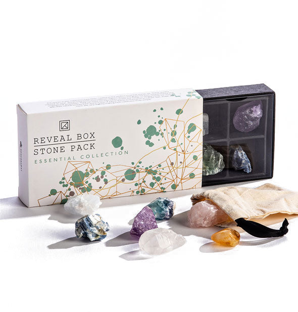 Reveal Box Stone Pack Essential Collection with crystals spread out in the foreground