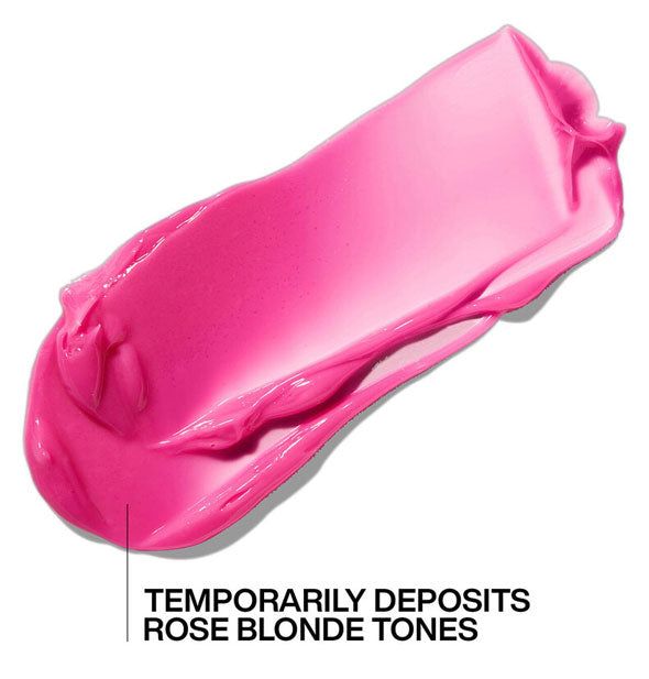 Closeup of pink Redken Rose Blonde Color-Depositing Mask sample is labeled, "Temporarily deposits rose blonde tones"