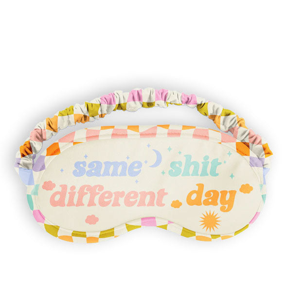 Sleep mask with multicolored checker print piping and ruched elastic band says, "Same shit different day" in multicolored pastel lettering accented with celestial graphics