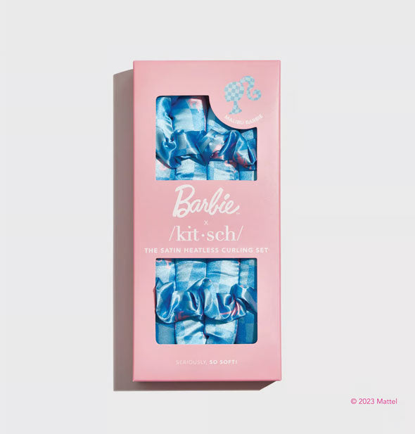 Pink box of Barbie x Kitsch Satin Heatless Curling Set with blue checker print satin items visible through packaging windows