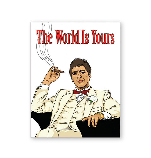 White greeting card with illustration of Al Pacino in an iconic Scarface scene says, "The World Is Yours" at the top in red lettering