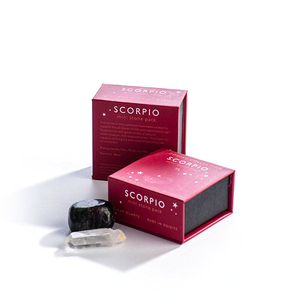 Two fuchsia Scorpio Mini Stone Packs with crystals displayed in front