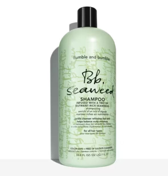 Green 33.8 ounce bottle of Bumble and bumble Seaweed Shampoo with black cap and lettering