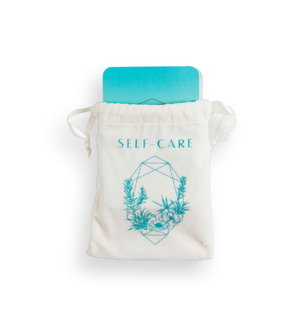 Self-Care cards emerging from a white drawstring printed bag