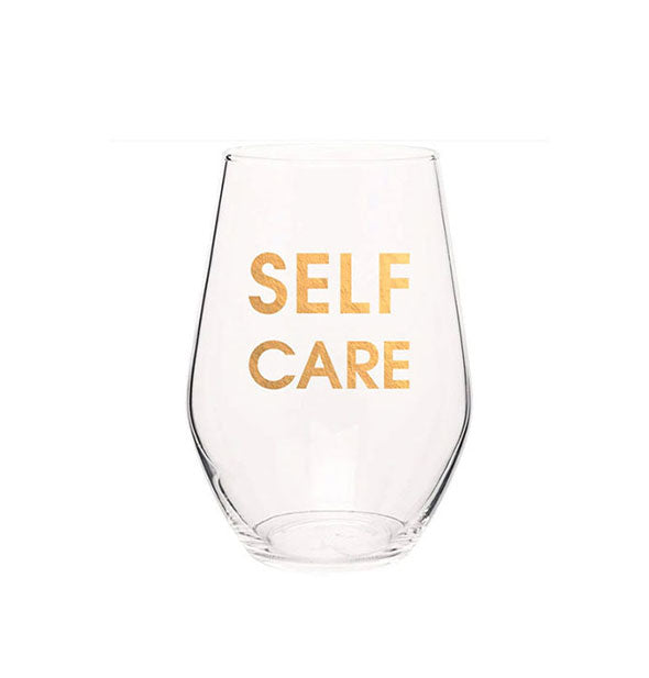 Large clear stemless wine glass imprinted with "Self Care" in metallic gold.