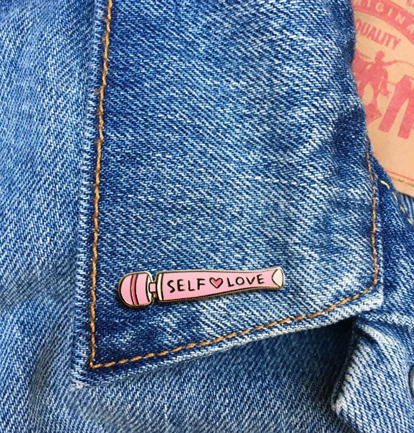 Self Love vibrator enamel pin on jean jacket lapel
