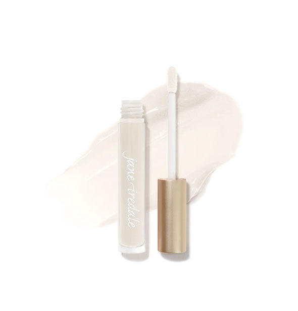 Tube of Jane Iredale HydroPure Hyaluronic Acid Lip Gloss with doe foot applicator cap removed and sample enlarged product application behind in shade Sheer