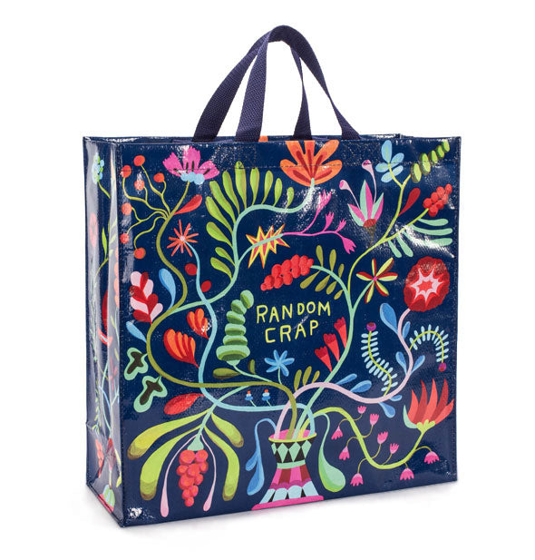 Navy blue tote bag with colorful flowers and vines design says, "Random Crap" in the center