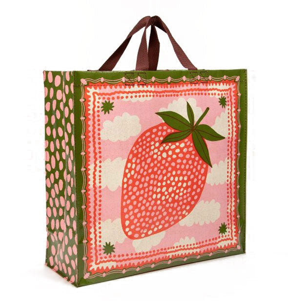 Square shopping bag with brown top handles features an all-over green and pink strawberry and clouds design
