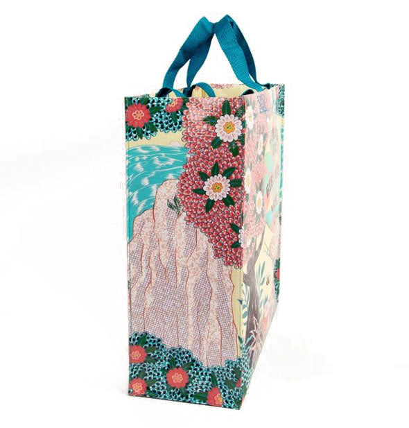 Shopping bag side panel with decorative illustrated tree, flowers, water, and rock design