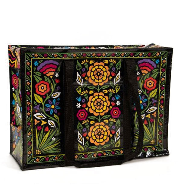 Large rectangular black tote bag features colorful all-over floral designs