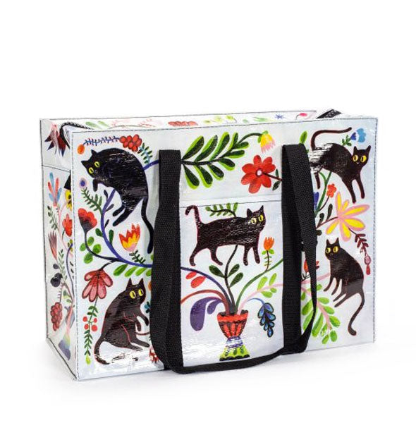 Rectangular bag with black straps and all-over florals, vines, and black cats design
