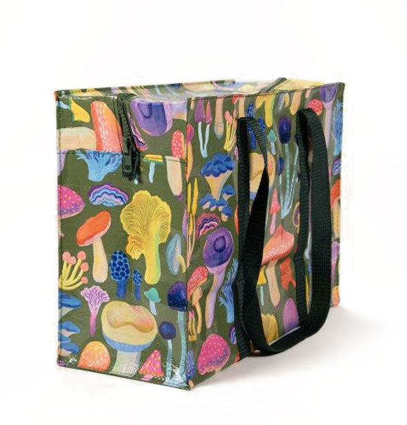 Large rectangular tote bag with dark green handles and top zipper features colorful all-over mushroom illustrations on a green background