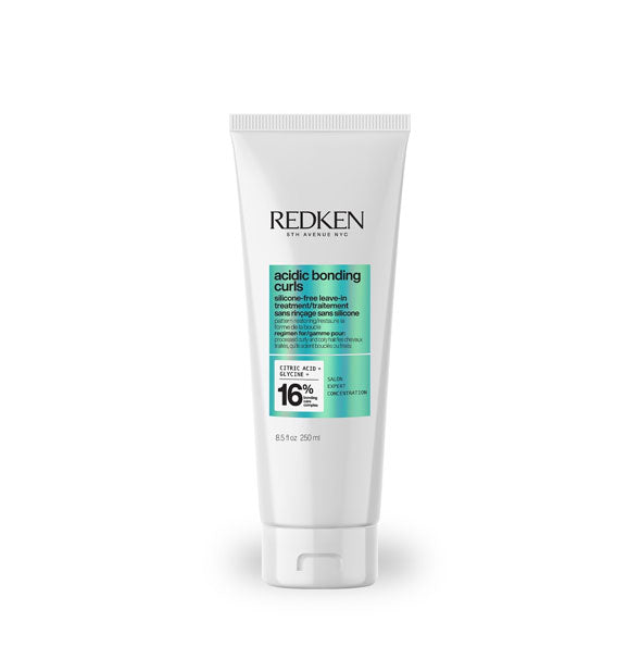 White 8.5 ounce bottle of Redken Acidic Bonding Curls Silicone-Free Leave-In Treatment with metallic teal color block and black lettering