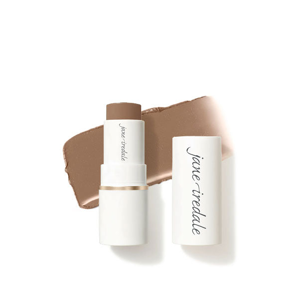 White tube of Jane Iredale Glow Time Bronzer Stick with cap removed and enlarged sample product application behind in shade Sizzle