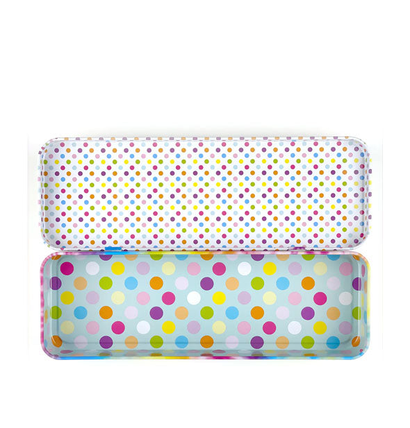 Opened rectangular box features two types of colorful polka dot print between top and bottom