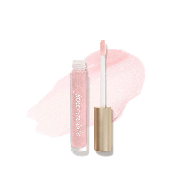 Tube of Jane Iredale HydroPure Hyaluronic Acid Lip Gloss with doe foot applicator cap removed and sample enlarged product application behind in shade Snow Berry