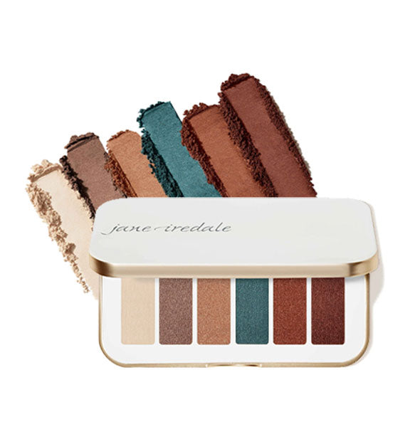 Opened white rectangular Solar Flare Jane Iredale eye shadow palette features six shades in dramatic jewel tones
