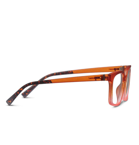 Pair of glasses with an orange ombre frame accented by brown tortoise temple tips