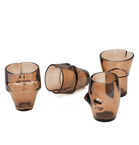 Body-shaped brown drinking glasses unstacked