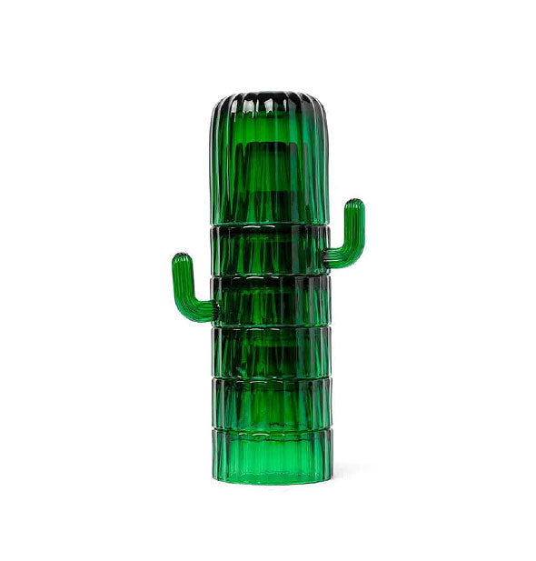 Set of six ribbed green drinking glasses stacked one on top of the other form a saguaro cactus shape