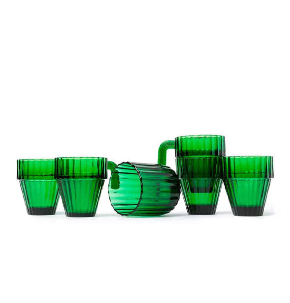 Six ribbed green drinking glasses