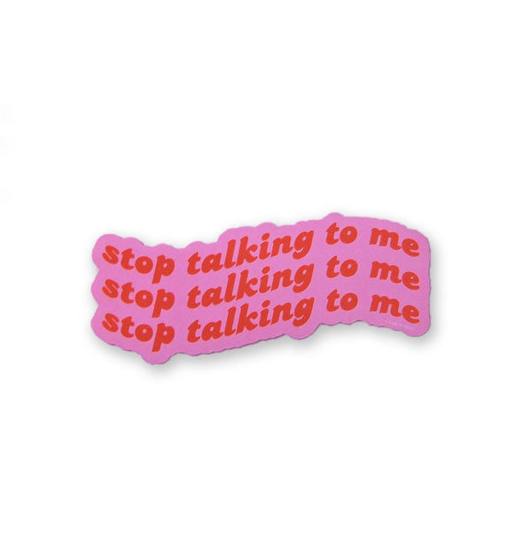 Sticker says, "Stop talking to me" three times in red lettering